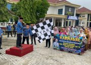 Pj Bupati Tuba Ferli Yuledi Pimpin Upacara Peringatan Hari Guru dan HUT Korpri